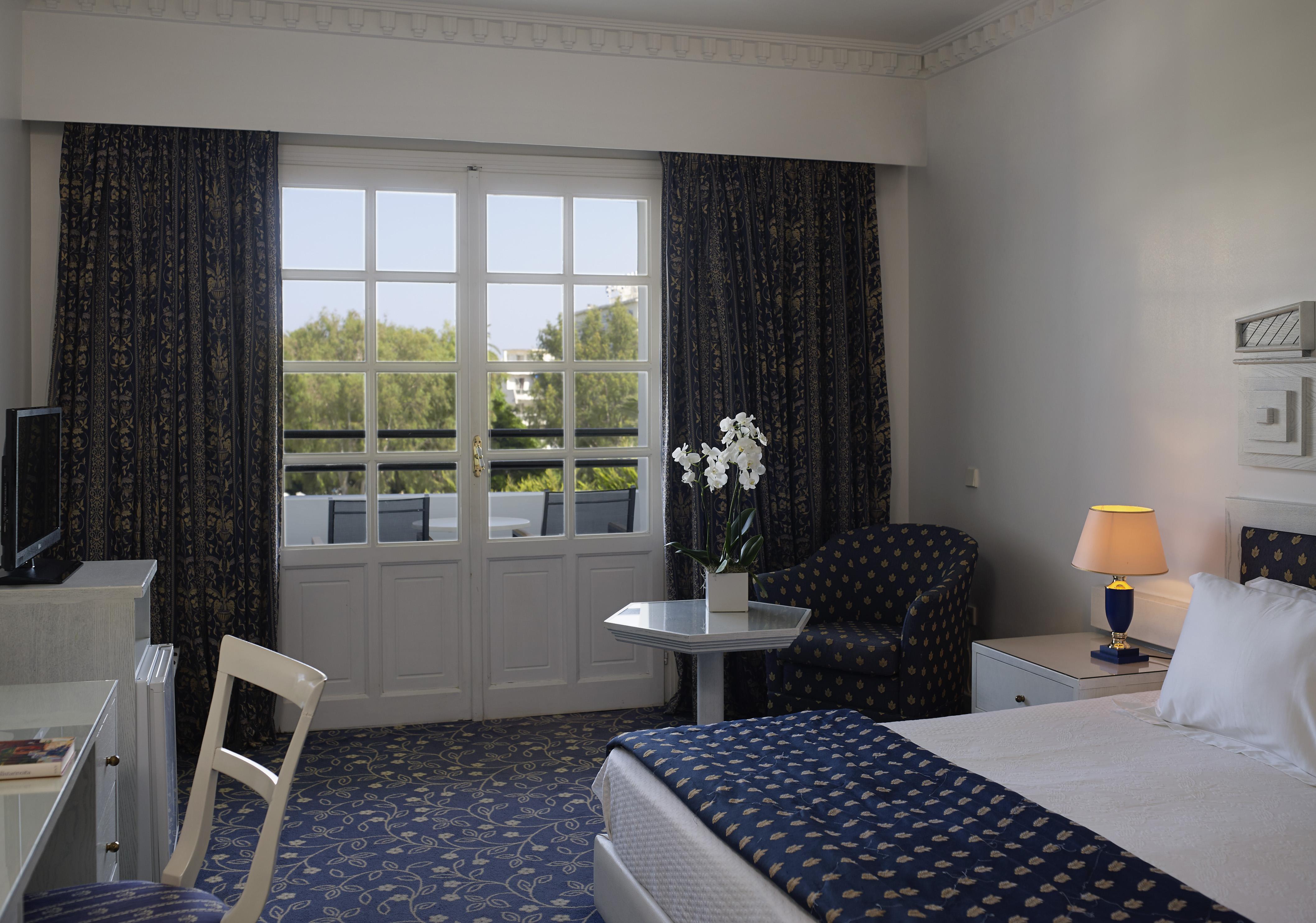 Mitsis Grand Hotel Rhodes City Exterior photo A room at the hotel