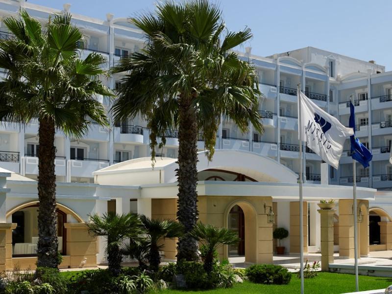 Mitsis Grand Hotel Rhodes City Exterior photo The flag of Greece flying at a hotel in Crete